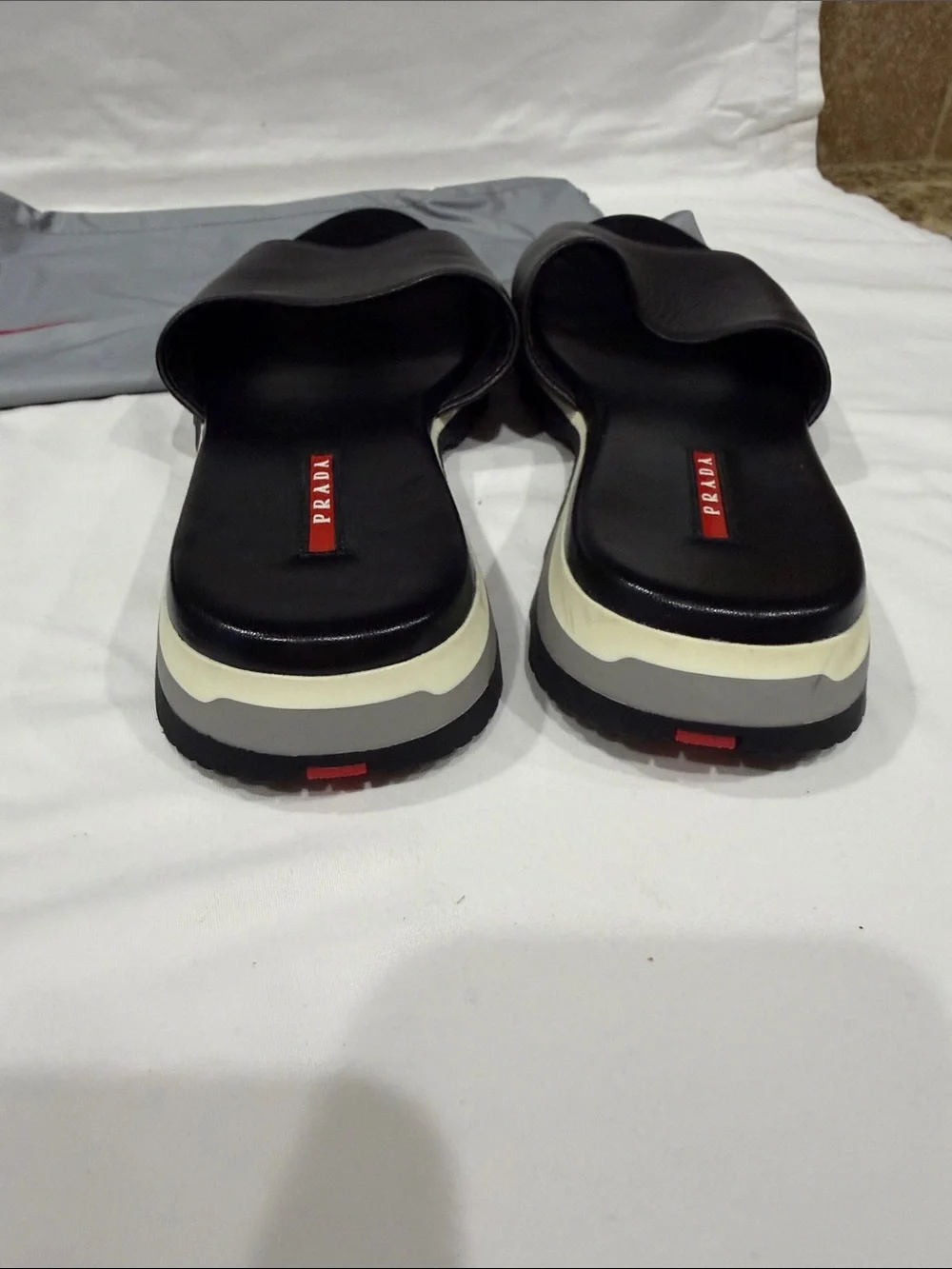 Prada Black Leather Men's Slide Sandals with White Trim
